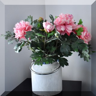 D75. Glass bucket with silver handle and faux flowers. 9”h - $18